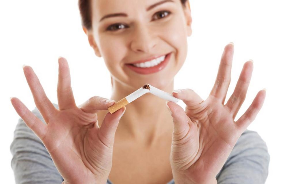 Come curare danni del fumo sui denti